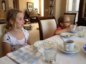 Little girls having tea party with Davidson's tea and Nature's Bakery fig bars